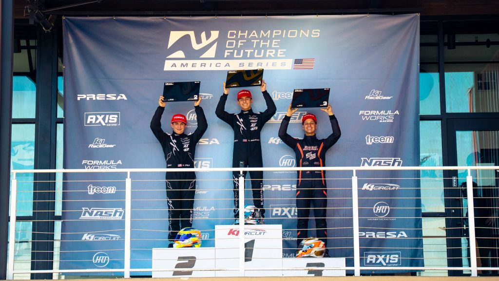 Keagan Kaminski,Matt Cagle, and Stephen Eisert stand on the podium with their KA100 Senior awards during Champions of the Future America's Round 3 event.