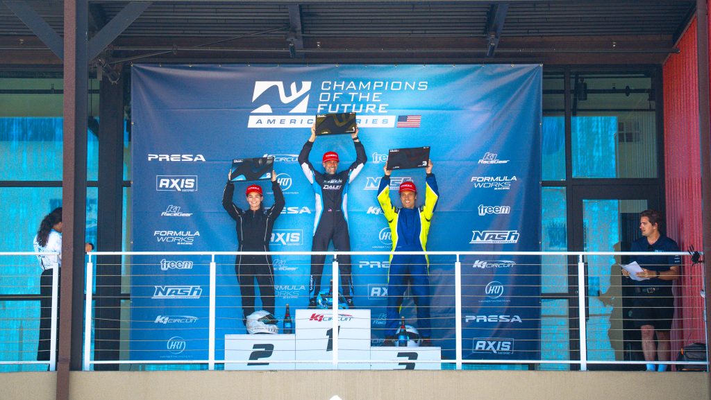 Joshua Daley, Ariel Abba, and Pietro Moro stand on the podium at K1 Circuit as the top three finishers of KA100 Heritage at K1 Circuit, Champions of the Future America Series Round 6
