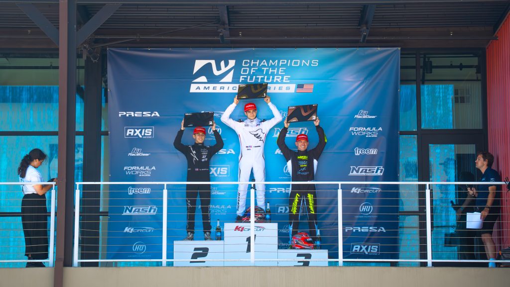 Sergei Karamseili, Keagan Kaminski, and Shane Hawkins stand on the podium at K1 Circuit as the top three finishers of X30 Pro at K1 Circuit, Champions of the Future America Series Round 6