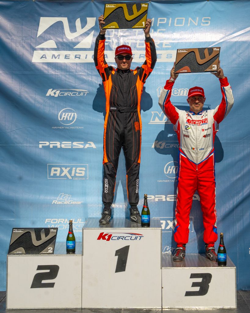 The top two KA100 Heritage drivers from COTF America's Round 5 event in Pahrump, NV stand on the podium with their trophies