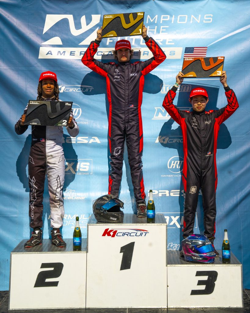 The top three KA100 Senior drivers from COTF America's Round 5 event in Pahrump, NV stand on the podium with their trophies