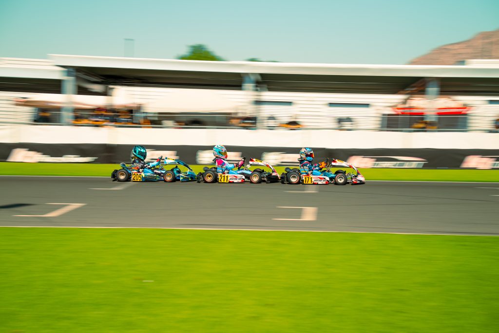 Benjamin Monroy leads Kendall West and Maddax Carlucci during Round 7 of COTF America